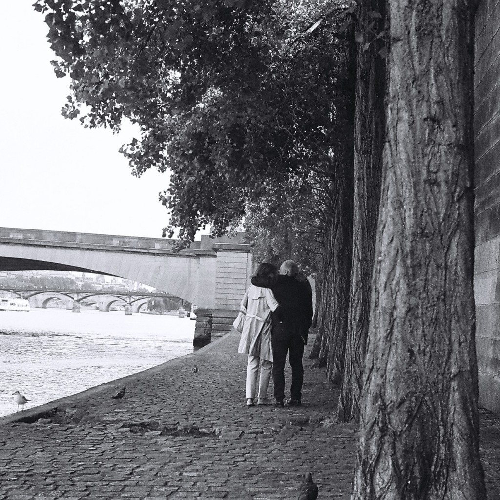 Stealing a kiss along River Seine.